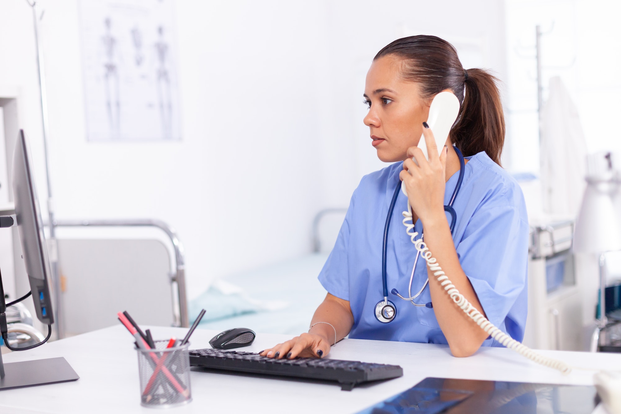 Medical nurse talking with patient