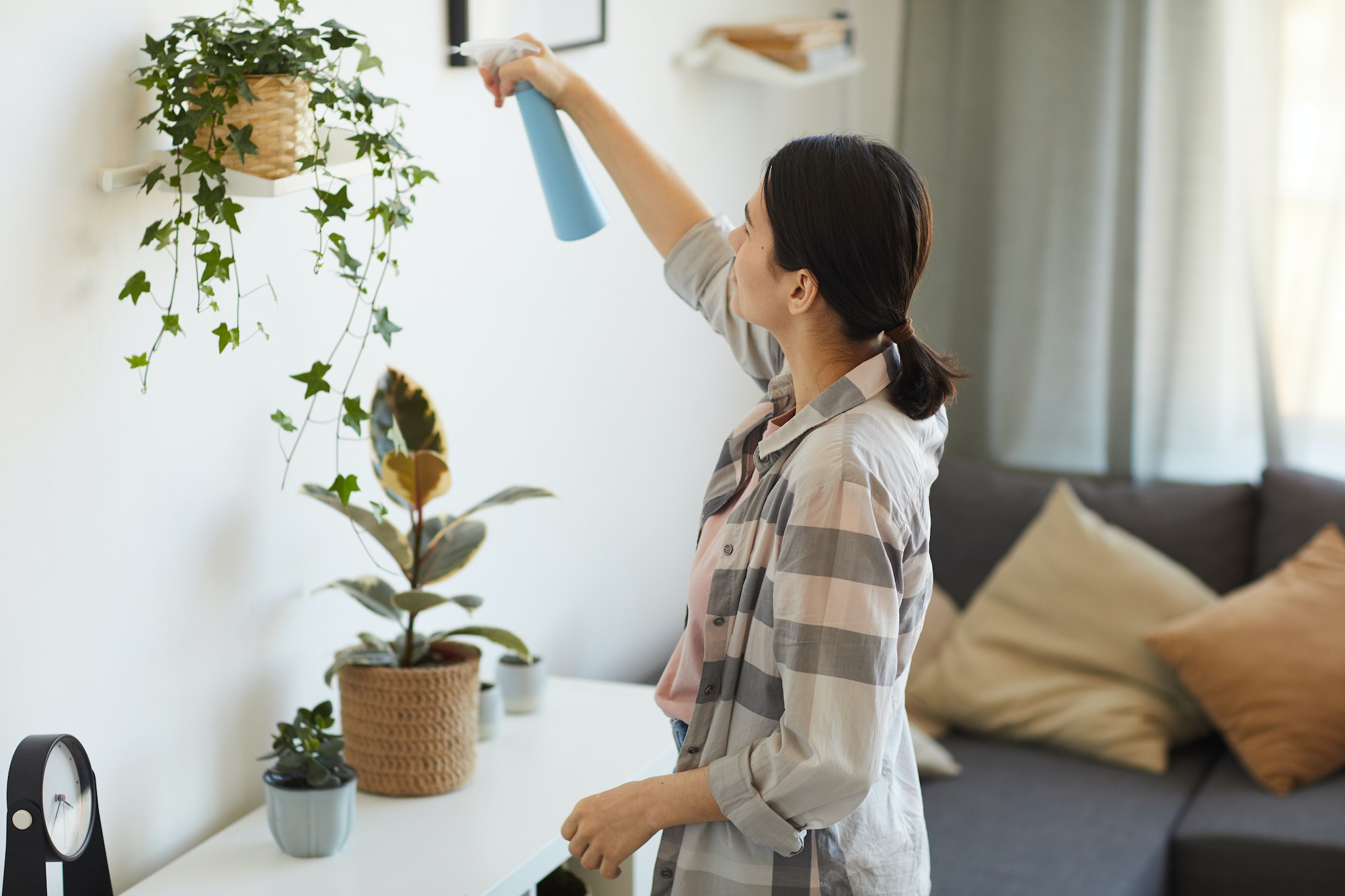 Woman watering flowers